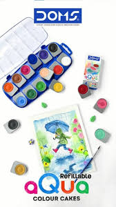 DOMS refillable watercolor set with color cakes and packaging on a white background